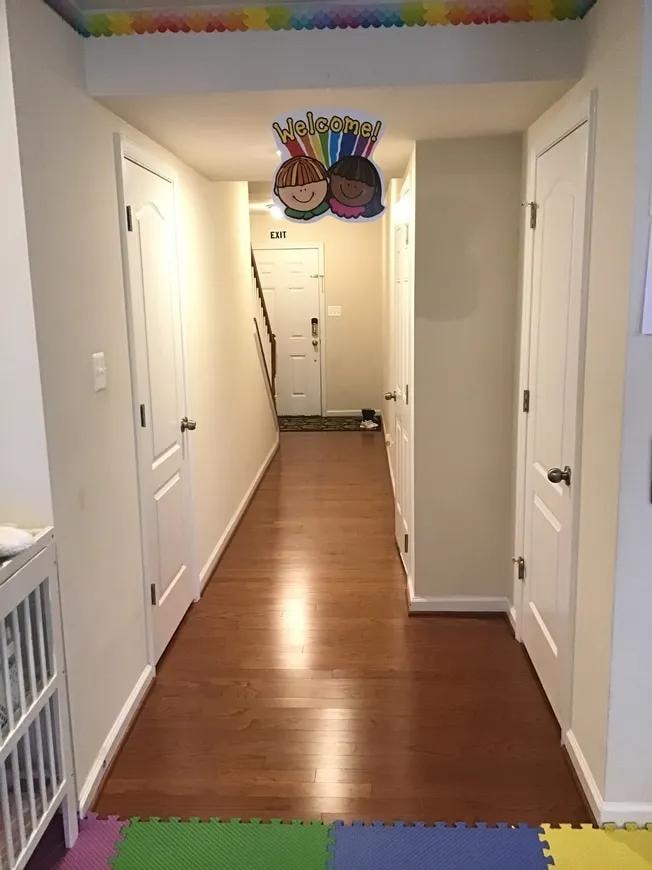 Welcoming child care hallway with colorful floor mats